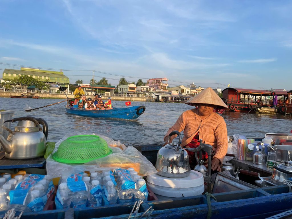 Coffee lady at the floating market